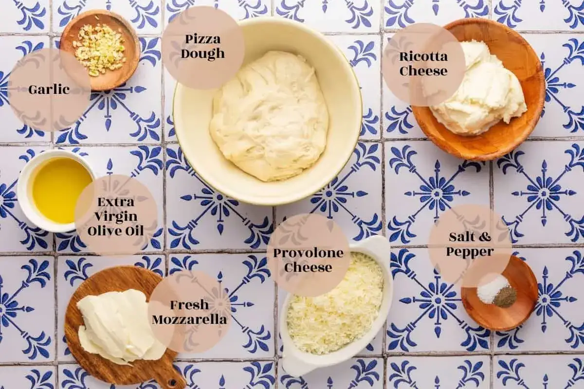 Ingrédients pour une pizza maison : pâte, ail, huile d'olive, mozzarella, provolone, sel, poivre et une généreuse portion de ricotta.
